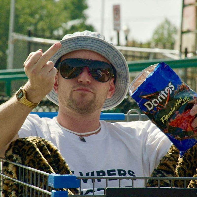 / Smoke | You_moved_you’re_out.JPG | Man in a shopping cart wearing Pit Viper Sunglasses