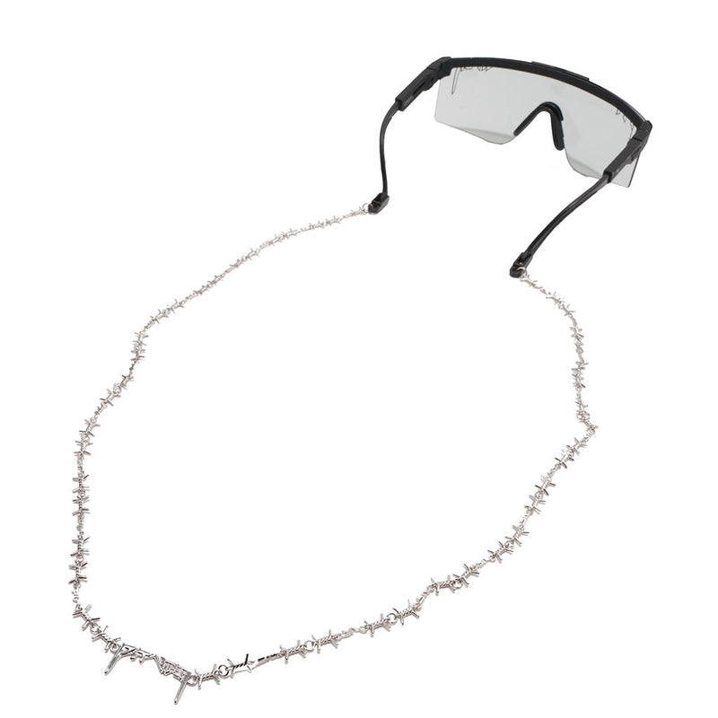 | i_am_being_held.JPG | The Barbed Wire RIG, necklace style chain sunglass retainer strap from Pit Viper