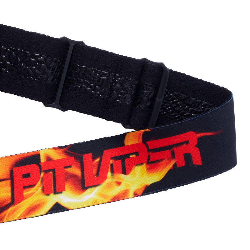 | it_the_strap.JPG | A close-up of a black adjustable strap with a buckle, featuring a printed design of red 'Pit Viper' text over a yellow and orange flame graphic on a white background.