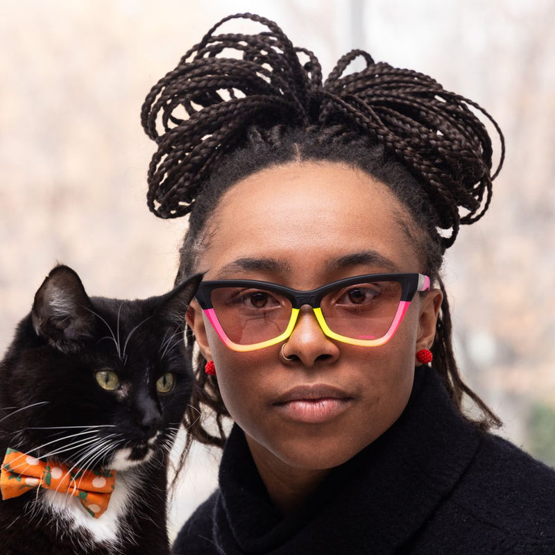 Photochromic Rose | photo_of_person_and_cat.JPG | Women wears The Italo Clawdia with a photochromic rose lens from Pit Viper