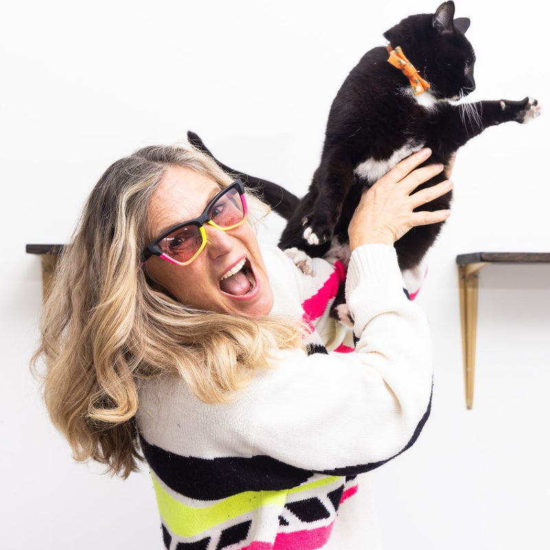 Photochromic Rose | photo_of_person_3.JPG | Womens holds cat while wearing The Italo Clawdia with a photochromic rose lens from Pit Viper