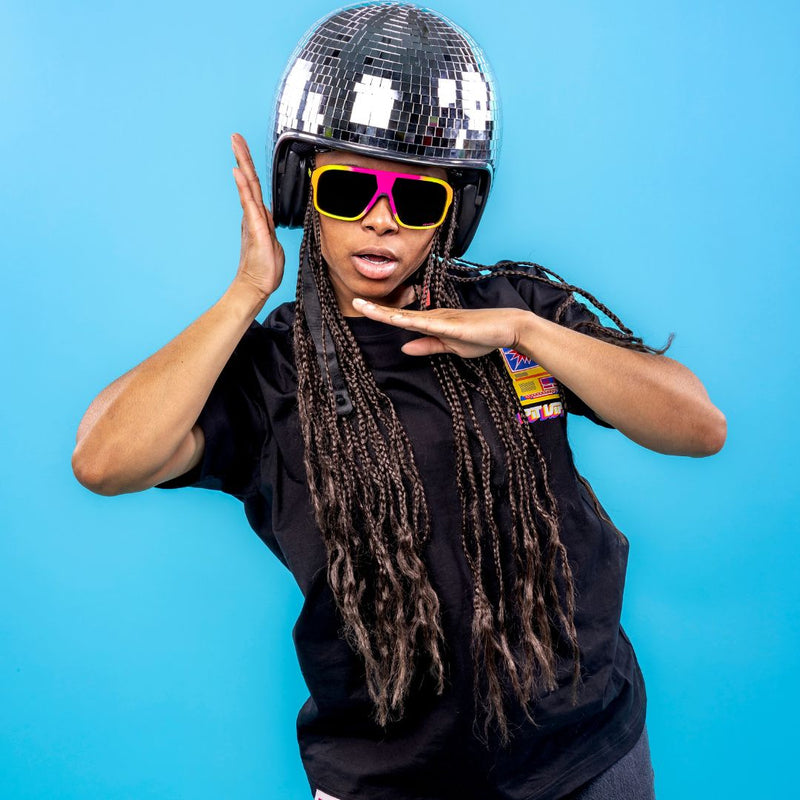/ Polarized Smoke | photo_of_person_2.JPG | Women in disco ball helmet wears The Italo Flight Optics with a Polarized Smoke lens from Pit Viper Sunglasses
