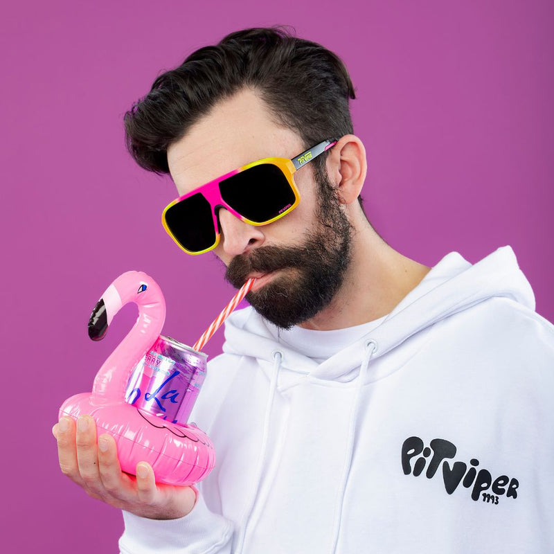 / Polarized Smoke | photo_of_person.JPG | Man sips straw wearing The Italo Flight Optics with a Polarized Smoke lens from Pit Viper Sunglasses