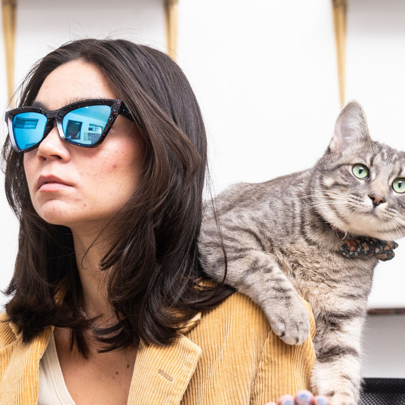 / Blue | photo_of_person.JPG | Woman wears The Midnight Clawdia with a blue lens from Pit Viper