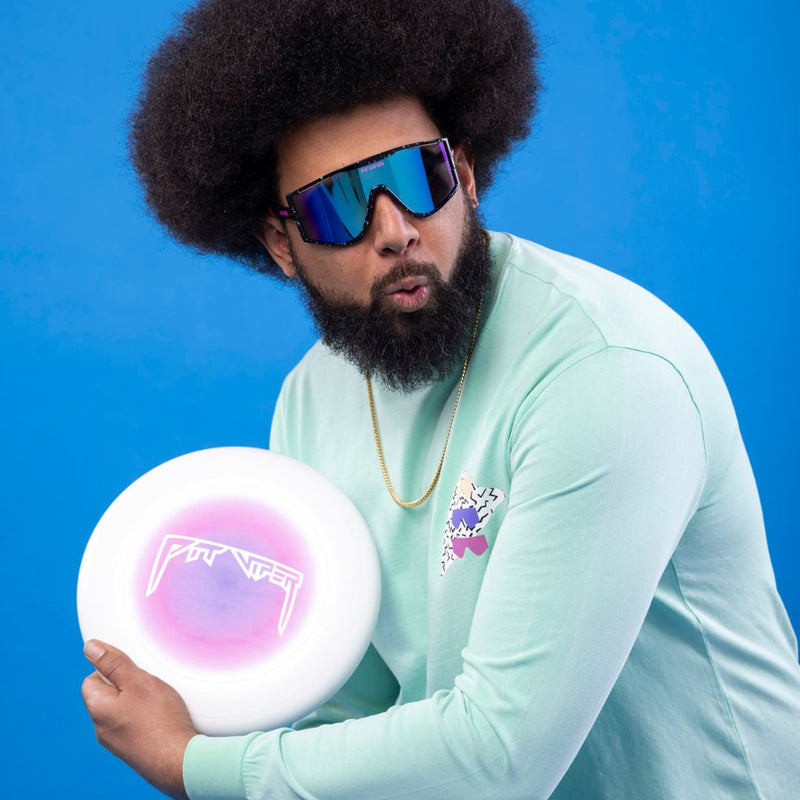 / Blue | photo_of_person.JPG | Man holds Pit Viper Frisbee wearing The Midnight Try-Hard from Pit Viper Sunglasses