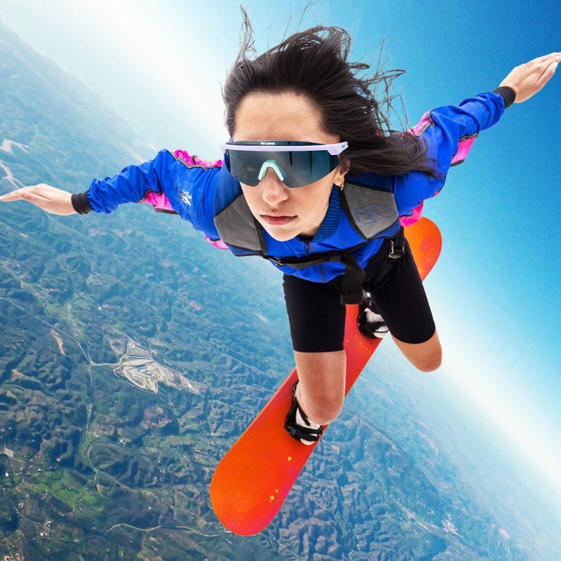 / Polarized Smoke | photo_of_person.JPG | Person pretends to fly wearing The Moontower Skysurfer with a polarized smoke lens from Pit Viper
