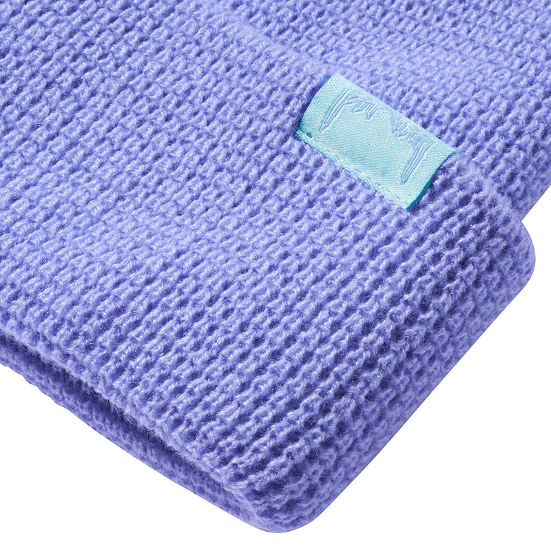 | im_ready_for_my_closeup.JPG | A close up photo of a knit purple beanie with a pit viper embroidered tag against a white background.