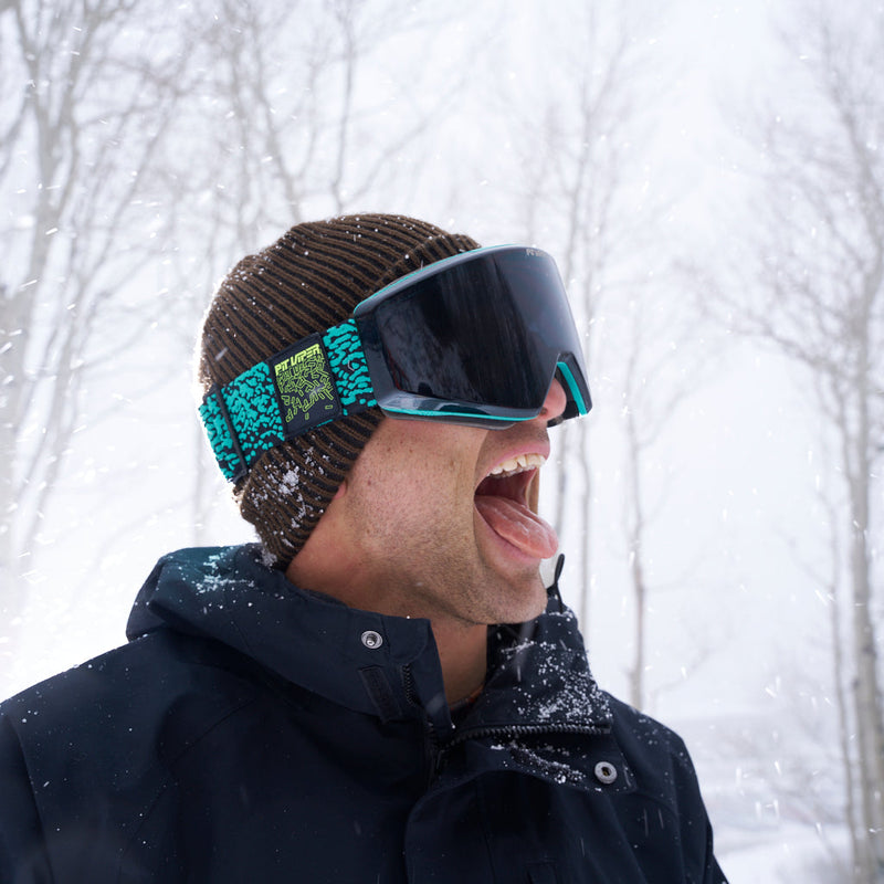 | nick_g_in_snow.JPG | Nick Goepper wearing the inferno groomer beanie in a snowy forest