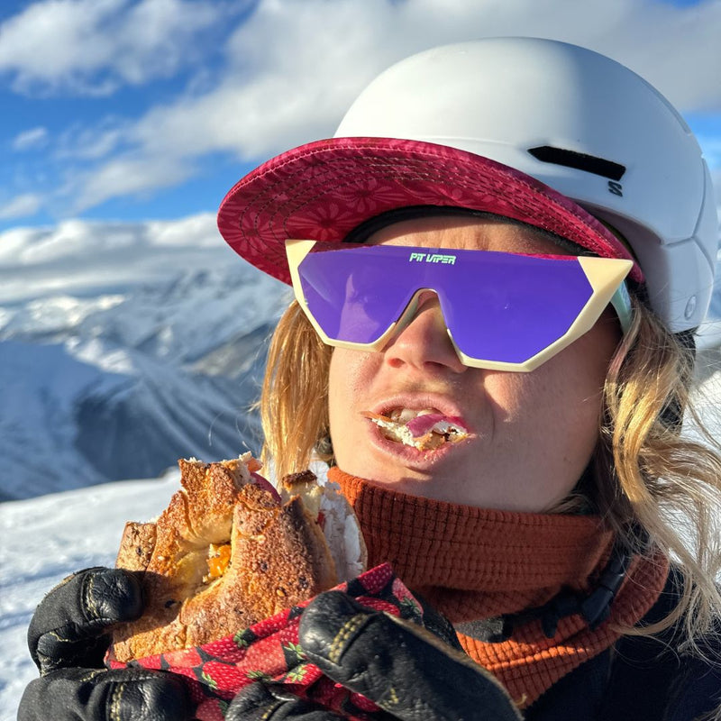 / Pink | photo_of_person_2.JPG | Women eating a sandwich in The Pink Passion Showroom from Pit Viper Sunglasses