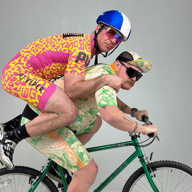 / Smoke | photo_of_people.JPG | Two men on a bike wearing The Exec Try-Hard from Pit Viper Sunglasses