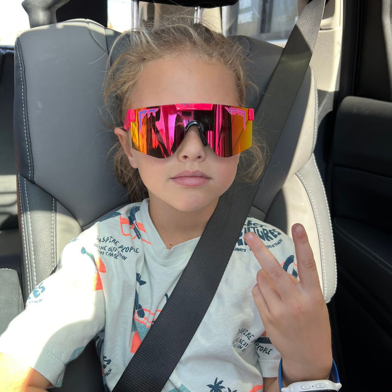 / Rainbow | AHHHHH.JPG | Kid in a car wearing The Radical XS from Pit Viper Sunglasses