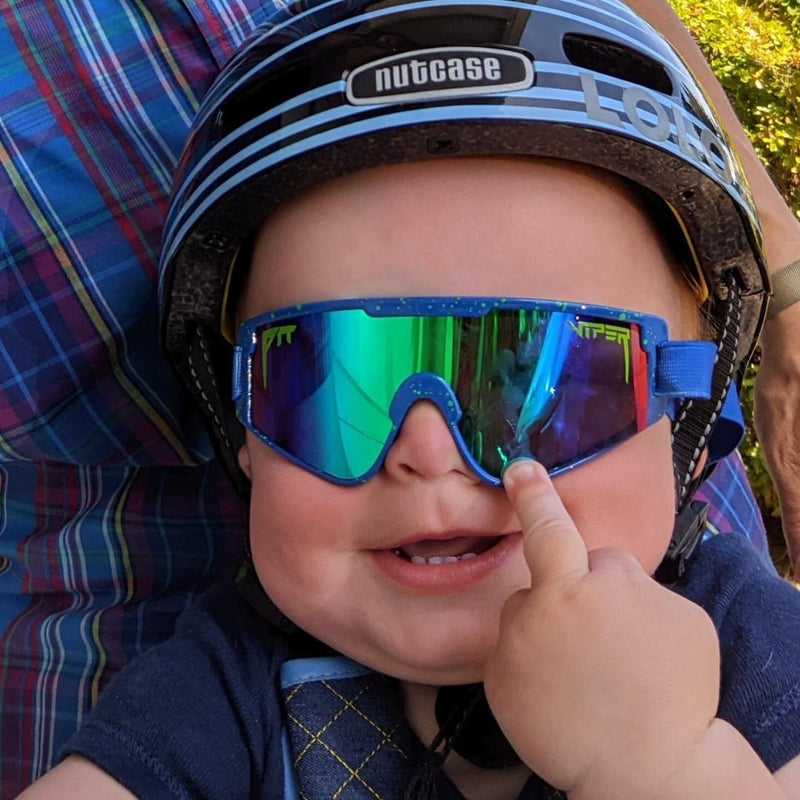  | poopoo.JPG | Baby wearing a helmet and The Leonardo Baby Vipes from Pit Viper Sunglasses