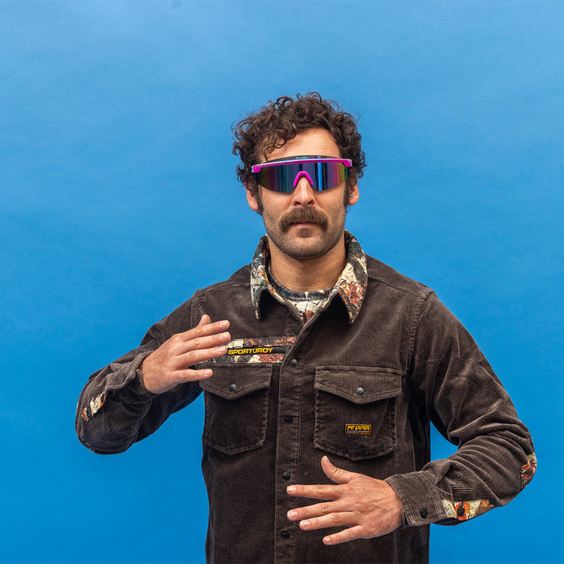  | photo_of_person_2.JPG | The Artificial Skysurfer from Pit Viper, teal and pink blade sunglasses