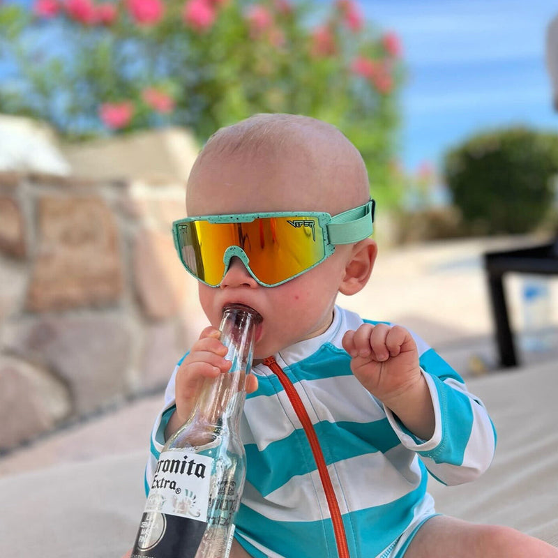 / Rainbow | he_said.JPG | Baby holding a beer bottle in The Poseidon Baby Vipes from Pit Viper Sunglasses