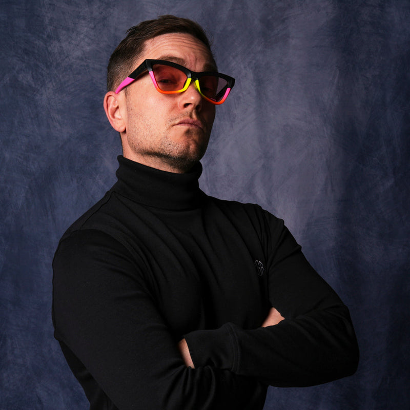 Photochromic Rose | photo_of_person_2.JPG | very important businessman wearing a turtleneck and cat-eye sunglasses
