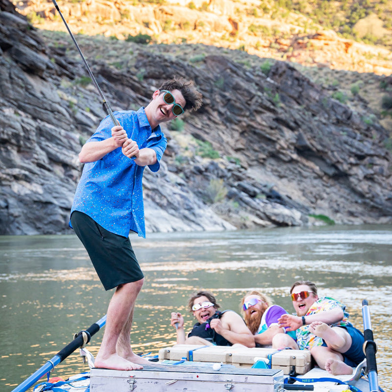 / Gold | photo_of_person.JPG | Man pretending to golf on a raft wearing Pit Viper Sunglasses