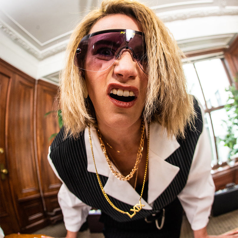 / Polarized Smoke | photo_of_confused_person.JPG| Woman making a face at the camera in The Exec Limousine from Pit Viper Sunglasses