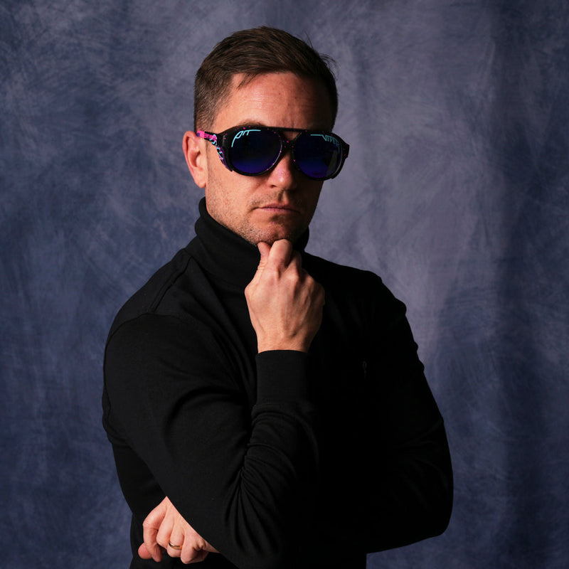 Polarized Z87+ Purple | photo_of_person.JPG | A very important businessman wearing The Ignition Exciters with a Polarized Z87+ Purple lens from Pit Viper Sunglasses
