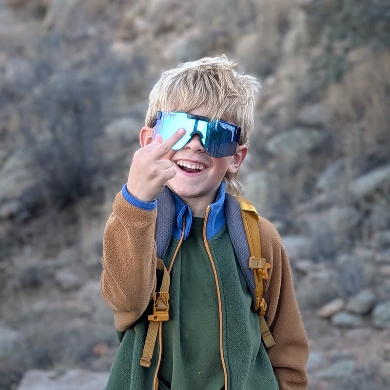 / Blue | photo_of_person.JPG | The Midnight Junior, child size sunglasses from Pit Viper