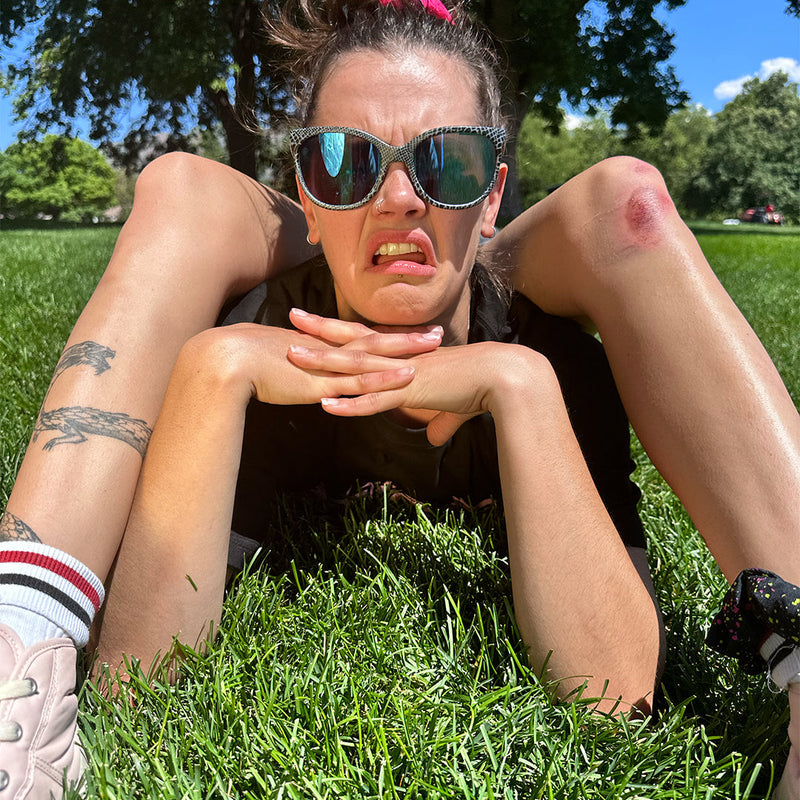  | photo_of_person.JPG | Woman posing wearing Pit Viper Sunglasses