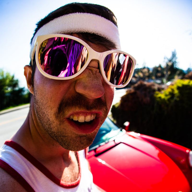 / Pink | photo_of_person_2.JPG | Man making a funny face wearing Pit Viper Sunglasses