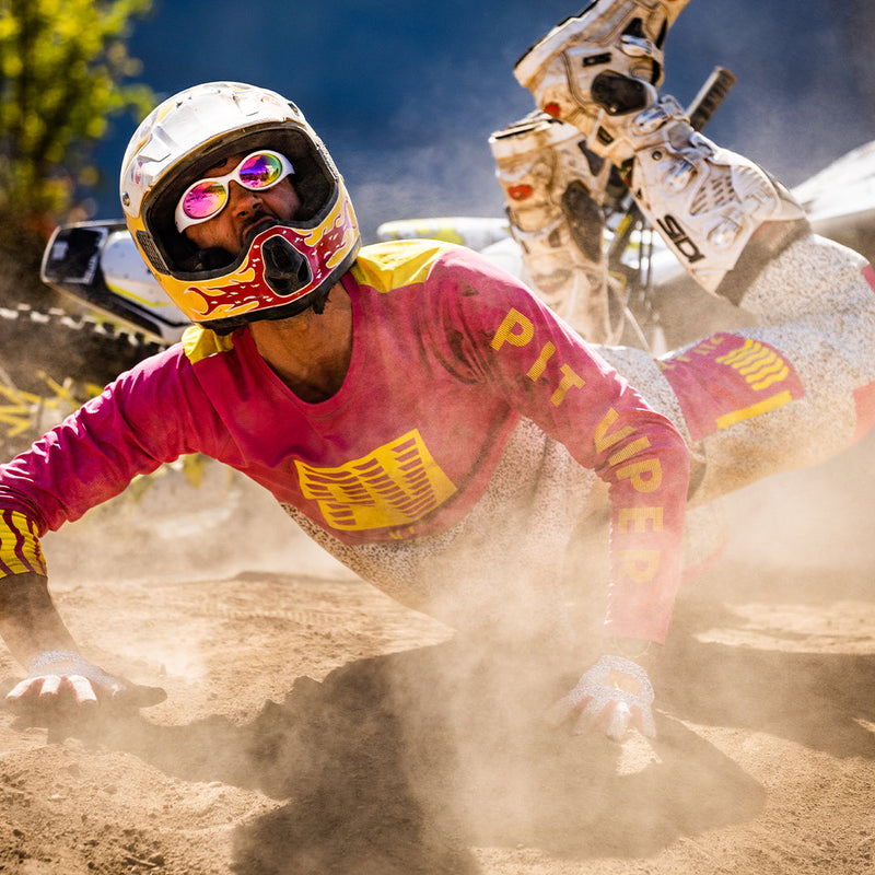 / Pink | photo_of_person.JPG | Man falling off of a dirt bike wearing Pit Viper Sunglasses