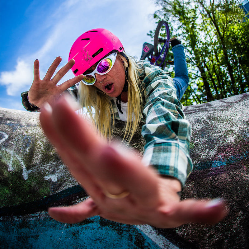 / Pink | photo_of_person_2.JPG | Woman falling off bike wearing Pit Viper Sunglasses