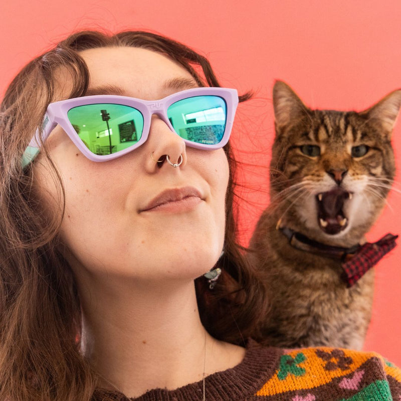 / Blue-Green | photo_of_person.JPG | Women wears The Moontower Clawdia with a blue-green lens from Pit Viper