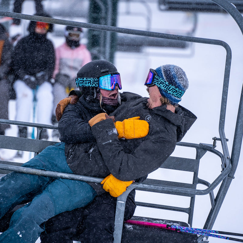  | but_i_do_want_to_go_home.JPG | Two people on a ski lift wearing The Voltage Proform Goggle by Pit Viper Sunglasses
