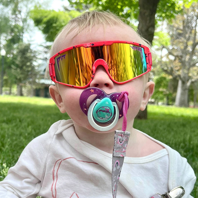 | guess_who.JPG | Baby with a passafire in The Radical Baby Vipes from Pit Viper Sunglasses