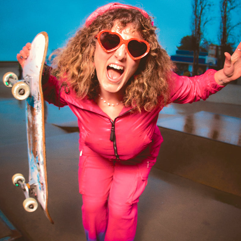  | want.JPG | Woman holding a skateboard in The Responder Admirer from Pit Viper Sunglasses