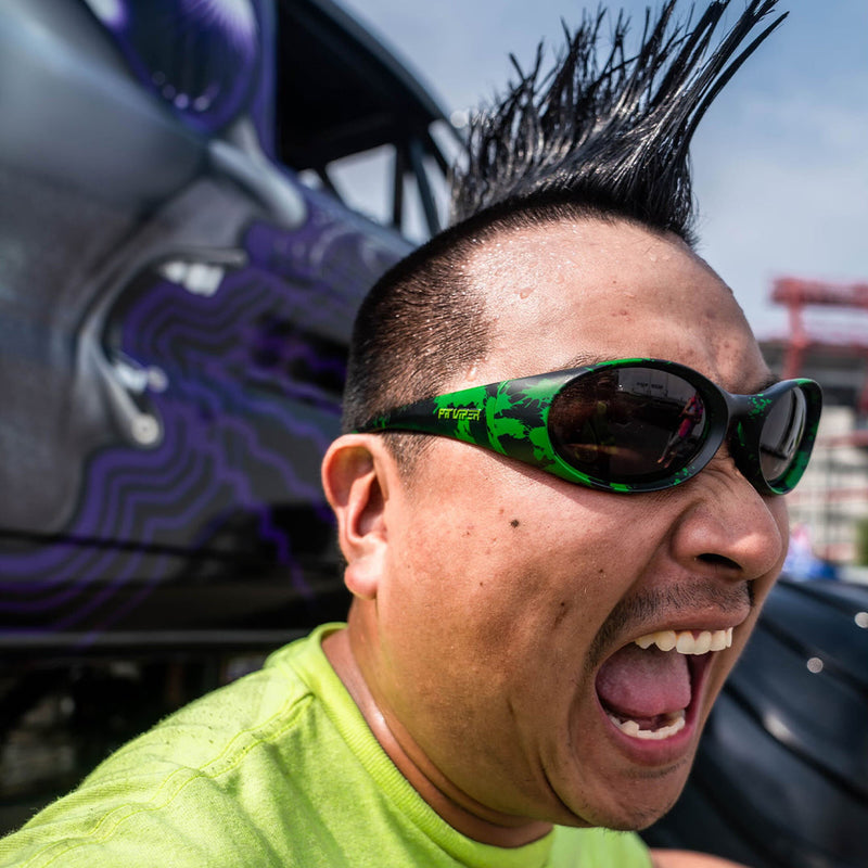 / Smoke | photo_of_person.JPG | Man with a mohawk wearing Pit Viper Slime Slammer Sunglasses