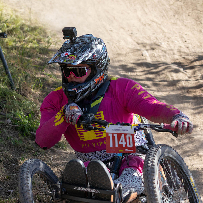 / Smoke | photo_of_person.JPG | Man mountain biking in The Son Of Beach Try-Hard from Pit Viper Sunglasses