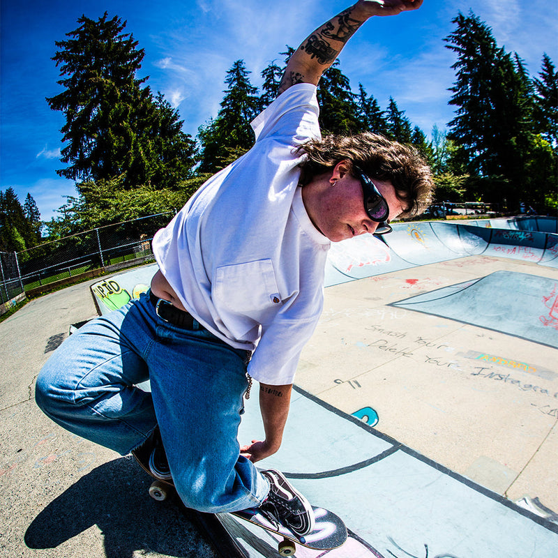 / Smoke | photo_of_person.JPG | Woman skateboarding wearing Pit Viper Sunglasses